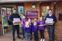 Kind - left to right: Ashley Perkins, Marketing Manager Milbank Group, Mr Woodcock, Deputy Head, with children from  Earls Colne Primary School & Nursery