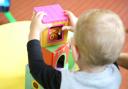 Closing - a stock image of a toddler at a pre-school