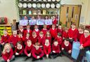 Smiles - pupils at Belchamp St Paul C of E Primary School celebrate its new report