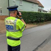 An officer conducting a speed check in Little Maplestead on Friday (Picture: Essex Police)