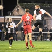 High rise - Halstead Town compete for a header Picture: ROB PRICE PHOTOGRAPHY