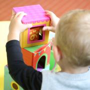 Closing - a stock image of a toddler at a pre-school