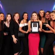 BIG CELEBRATIONS: Lois and her team celebrate being crowned best in Essex