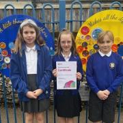 Celebrations - Holy Trinity pupils with the award