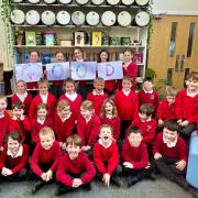 Smiles - pupils at Belchamp St Paul C of E Primary School celebrate its new report