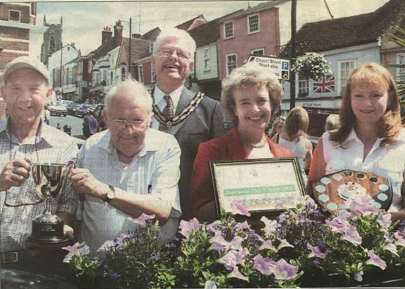 VICTORY: Halstead in Bloom town centre winners of 2002 celebrate their prizes