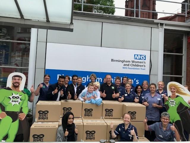 NHS staff with Nigel and Noah at Birmingham Children's hospital