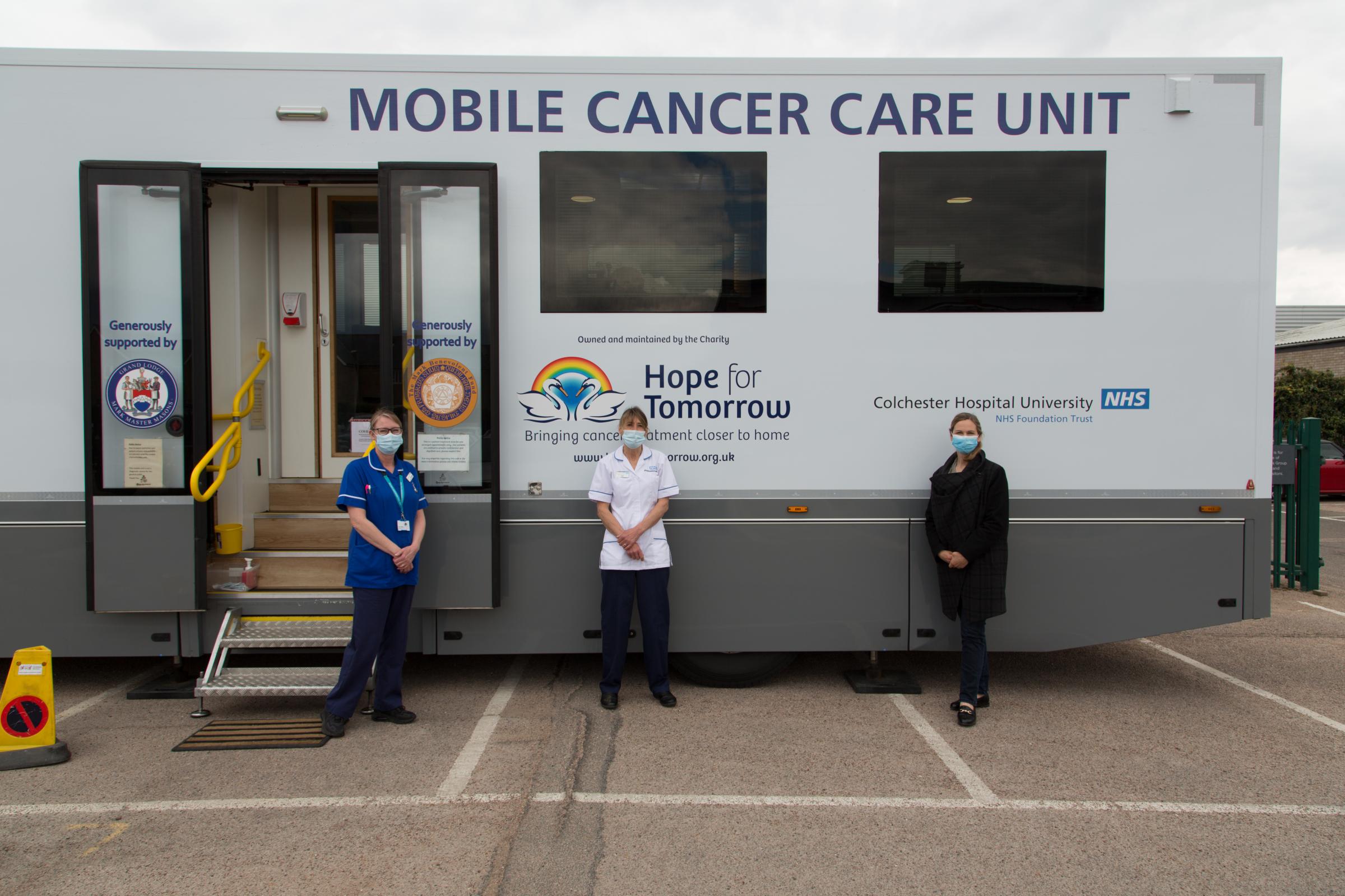 Catherine Gaskell with nurses outside the mobile unit in Stanway. Photo - Rob Gaskell