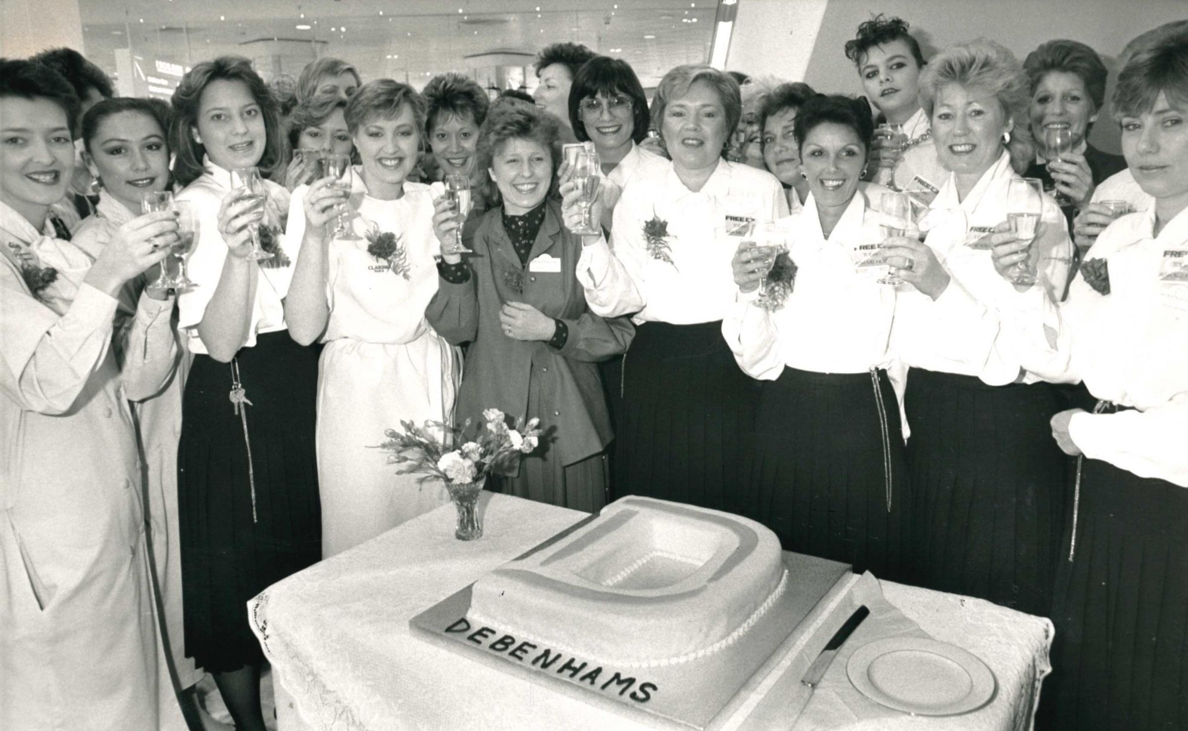 Cheers - staff celebrate the official opening of Debenhams in October 1987.