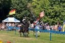 Knights visiting the castle grounds last year for a special joust event