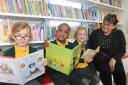 Budding Readers: Amaya 5, Kaiden 4, Elsie 4 and teacher Claire Jeggo at St Giles Primary School.