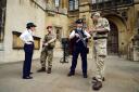 Metropolitan Police Commissioner Cressida Dick speaks to a Colchester paratrooper at the Palace of Westminster while Major General Ben Bathhurst speaks to an officer. Victoria Jones/PA Wire