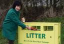 GREEN MACHINE: Wendy Schmitt pictured with one of the newly installed bins on the A131