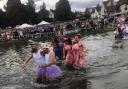 WET AND WILD: Teams trudging through the parish pond (All Pictures: Finchingfield Three-Legged Race)