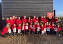 Children and staff celebrate after the Park Nursery in Sible Hedingham was rated outstanding