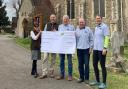 Fundraising - members of the Earls Colne Bellringers pictured outside St Andrew's Church receiving a cheque for £500 for the Bellfund on April 26 from Blackwell Earthmoving Limited