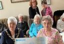 CHARITABLE DONATION: Jackie Pell presents the cheque to the Halstead Day Centre