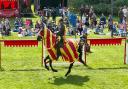 NO TIME TO SPEAR: A knight on horseback pictured during the jousting