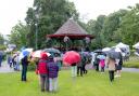 SINGING IN THE RAIN: The Big Sing Choir performing to guests