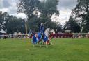 RIDE ON: A knight jousting in the arena