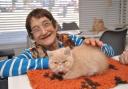 Kathy Knopp with 'grumpy' Alfie at Halstead's new Meow Cat Cafeat