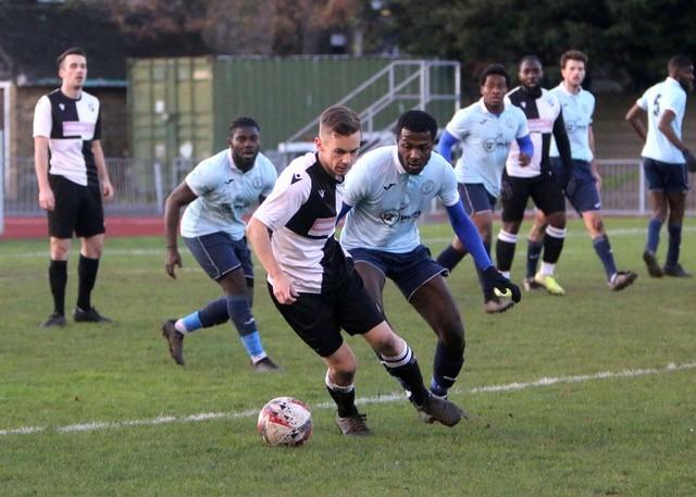 On the ball: Halstead Town were victorious over May and Baker. Picture: IVOR DALLINGER