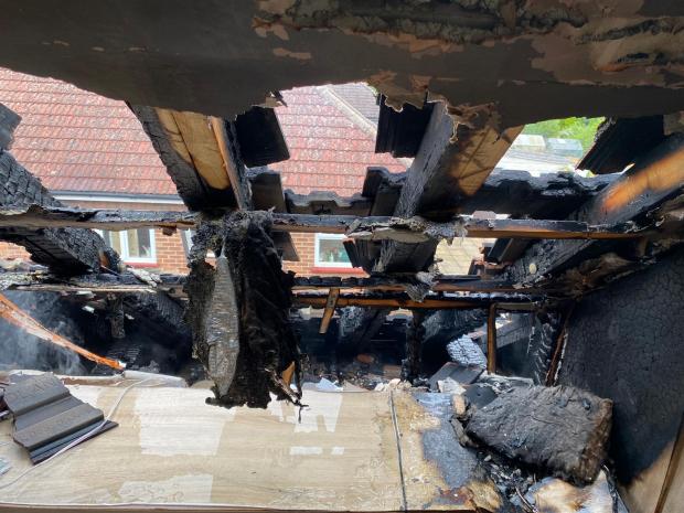 Halstead Gazette: The roof of the bungalow was singed in the aftermath