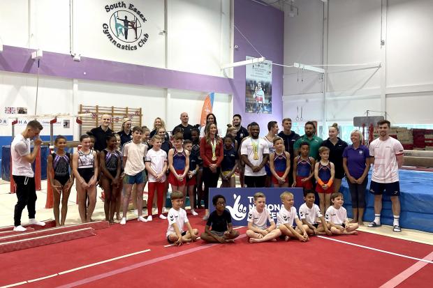 Halstead Gazette: Max Whitlock (left), Georgia-Mae Fenton (centre) and Courtney Tulloch poses for photographers at the South Essex Gymnastics Club (PA)