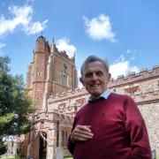 Charlie Bird, member of the Voices from the Pews research team outside St Nicholas Church