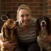 Pet Carer: Eve looks after many dogs after finding her love for them during volunteer work at a shelter. (Credit to Dave Knight)