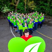 Going green: Envrionment councillor Wendy Schmitt, together with Great Bradfords Junior School children. (PAUL STARR Photographer)