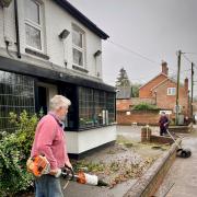 Cleaning Up - Members of the community teamed up to help the favoured village restaurant