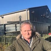 New Management - one of the Petersfield Village's new directors John Potter, in front of the main barn