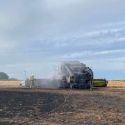 Fire crews tackled combine harvester which had caught fire (pic: Halstead Fire Service)