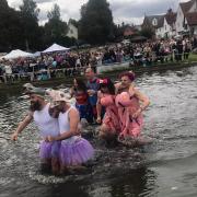 WET AND WILD: Teams trudging through the parish pond (All Pictures: Finchingfield Three-Legged Race)