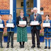 Headteacher Carolyn Moss and rotary club president David Ainge, with heads of school Lexi, Freddie and Madeleine (Picture: Tony Sale)