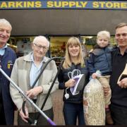 Bob and Don Darkins, left, with Victoria, Stephen and son Toby Metson, when they took over the store in 2015