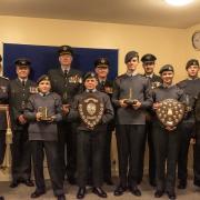 The trophy winning cadets with invited guests