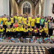 The Halstead Road Runners donated plenty of much-needed items to the food bank