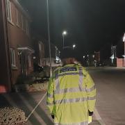 Safety - a police officer conducting an evening patrol in Halstead