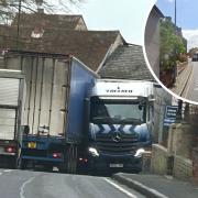 Traffic - A view of two lorries struggling to get past