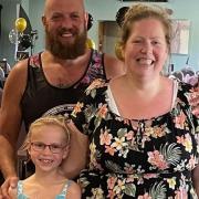 Strong - A family photo of Melissa Hardy with her daughter Grace Hardy and husband Phil Hardy