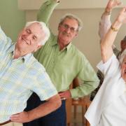 Keeping fit - a group of elderly people exercising