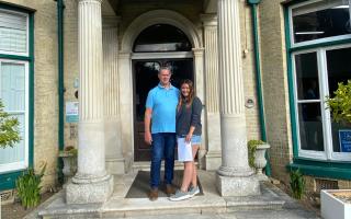 BIG SUCCESS: Robyn Locke with her father after collecting her results