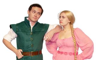 Pantomime - reluctant hero Rudi next to pantomime protagonist Rapunzel  (Image: Stane Street Players)